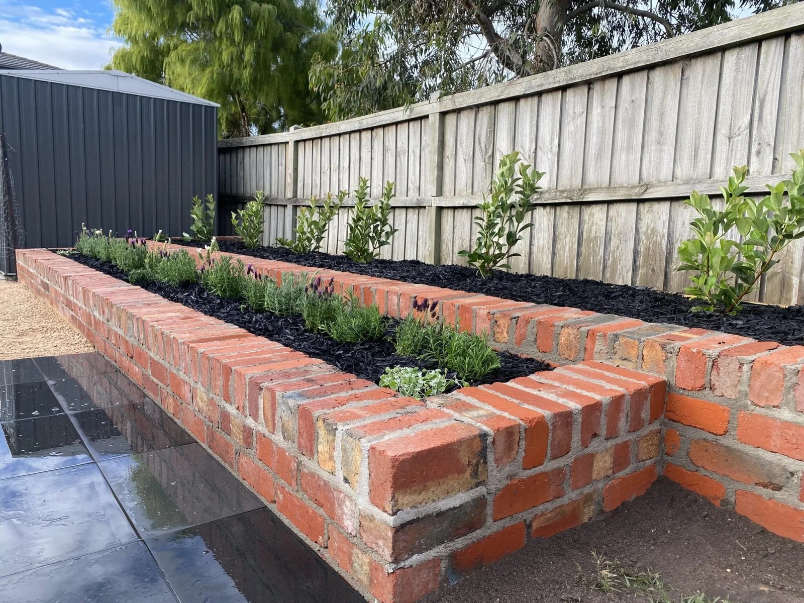 Built-In Red Brick Raised Beds