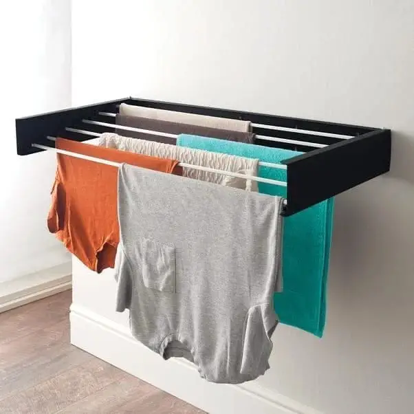 Utilize Wall-Mounted Drying Racks in Your Small Laundry Room